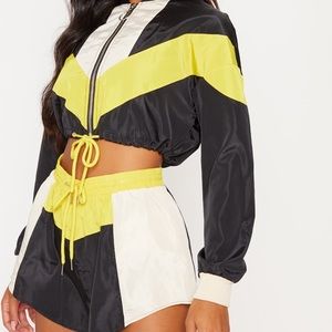 Cream colour shell suit